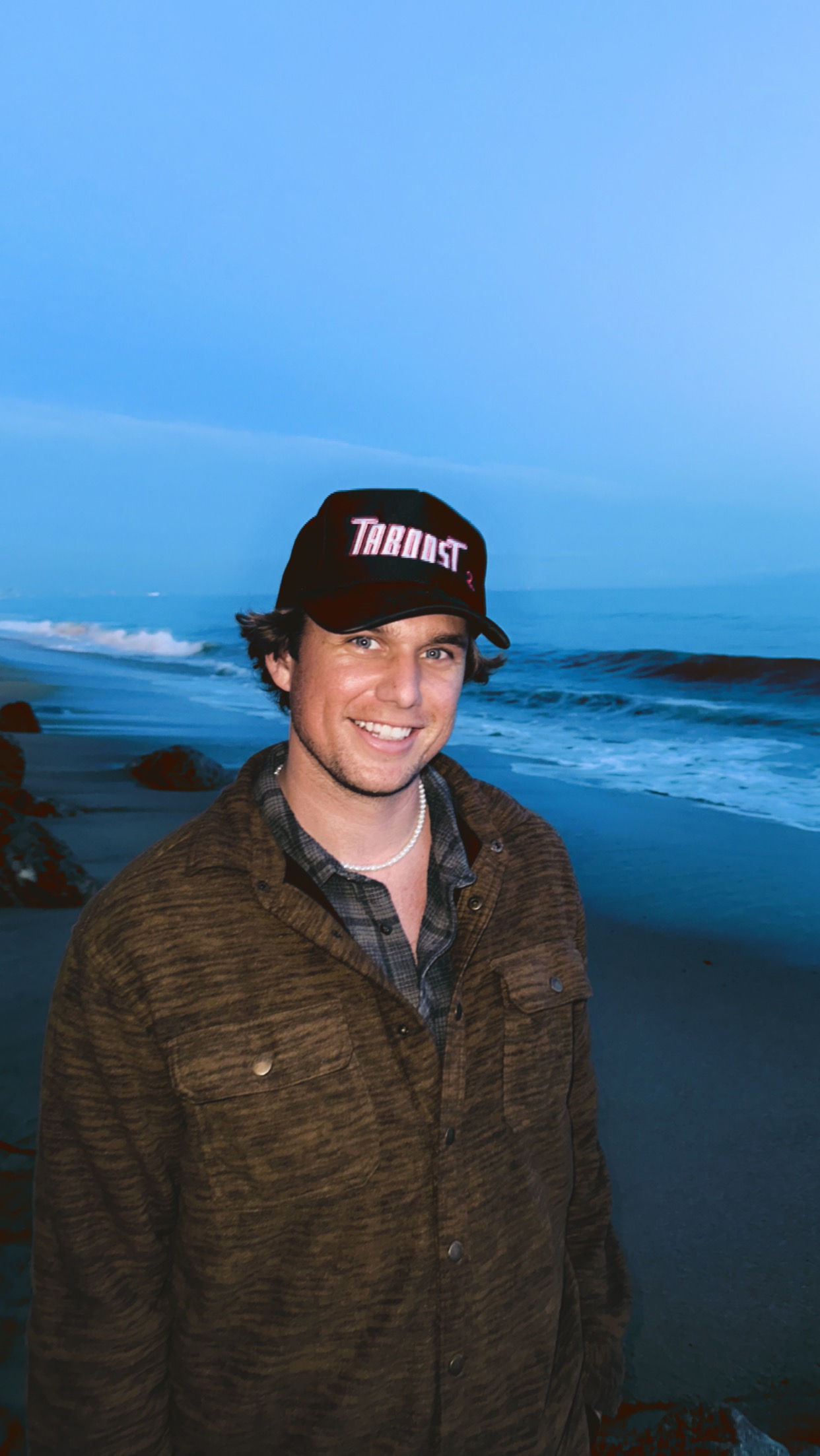 Kyle Russell on the beach in Malibu at dusk